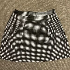 The limited brand black skirt with white Polka dots
